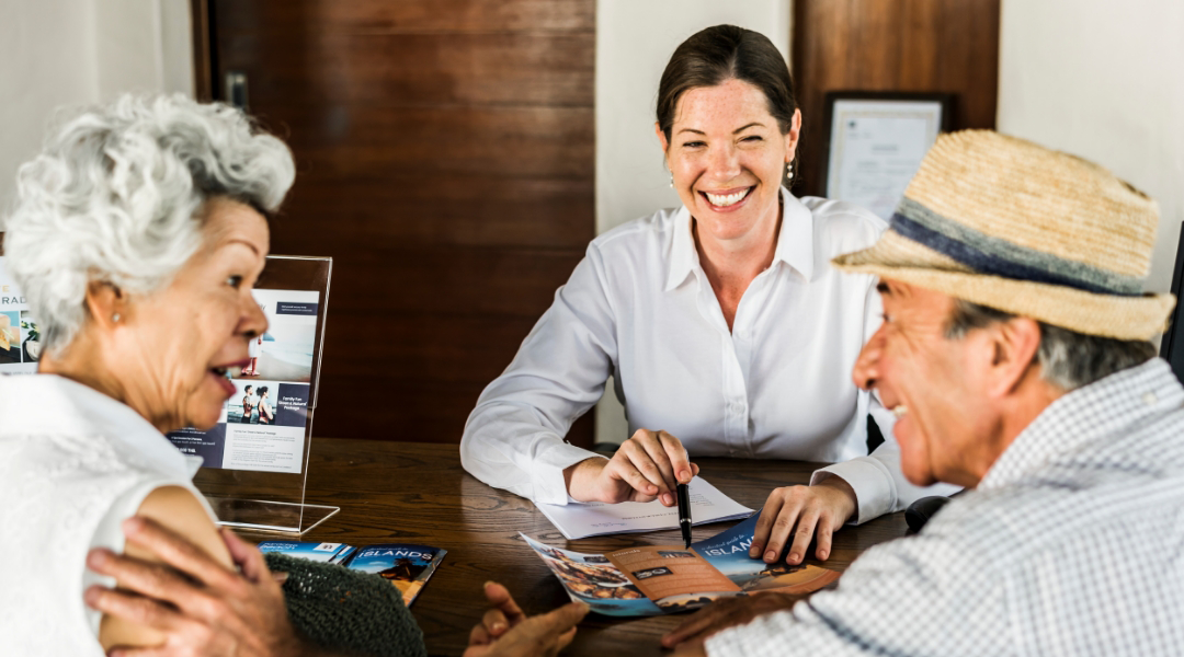 hospitality sales rep talking to an older couple